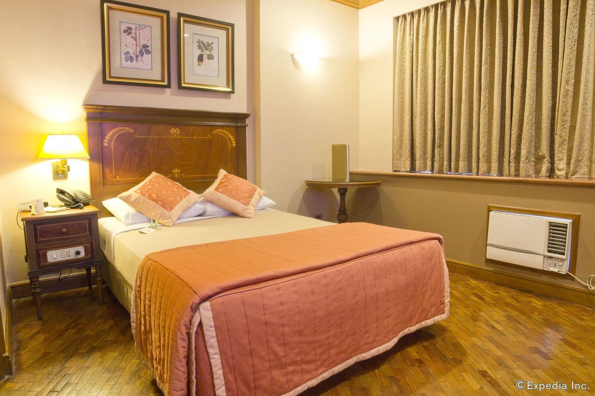 Herald Suites Макати Экстерьер фото